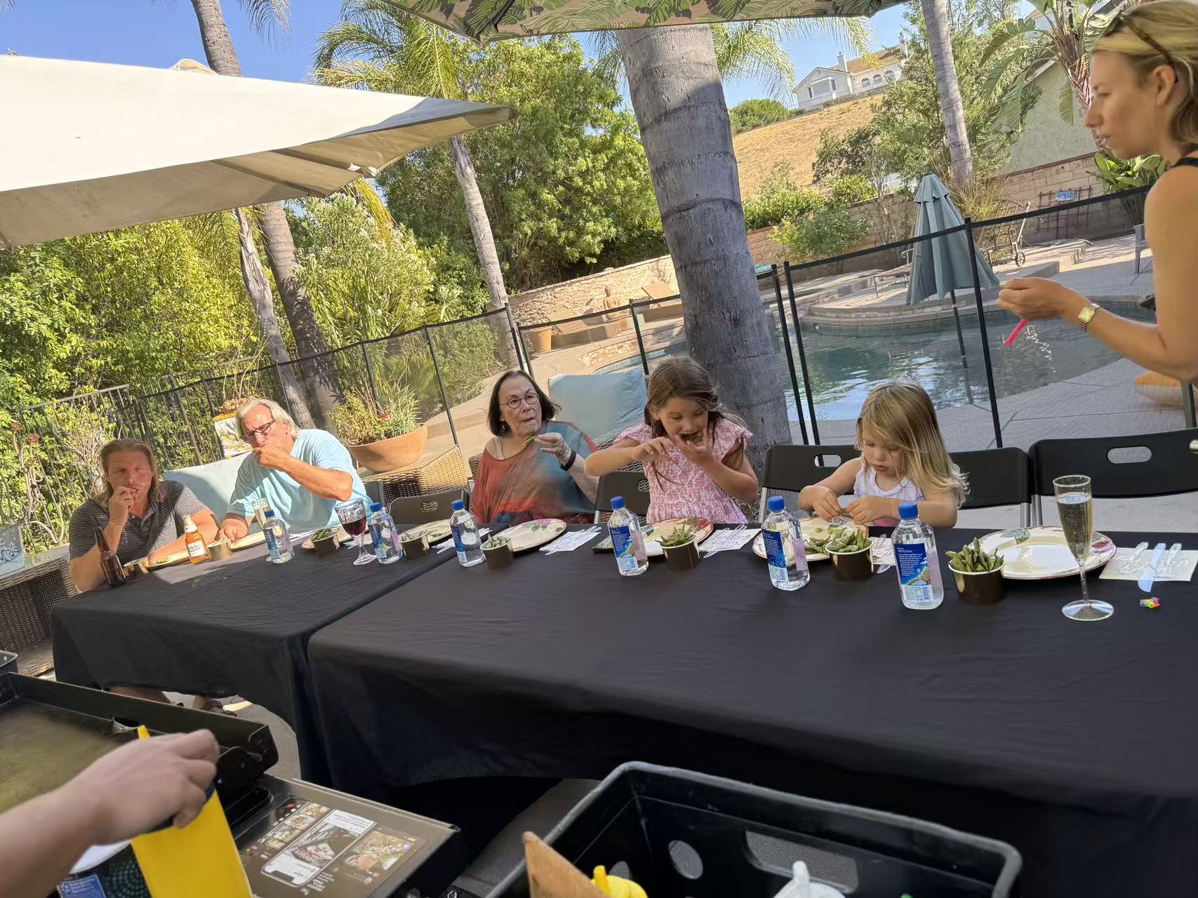 Professional hibachi chef preparing delicious meal for Los Angeles home guests